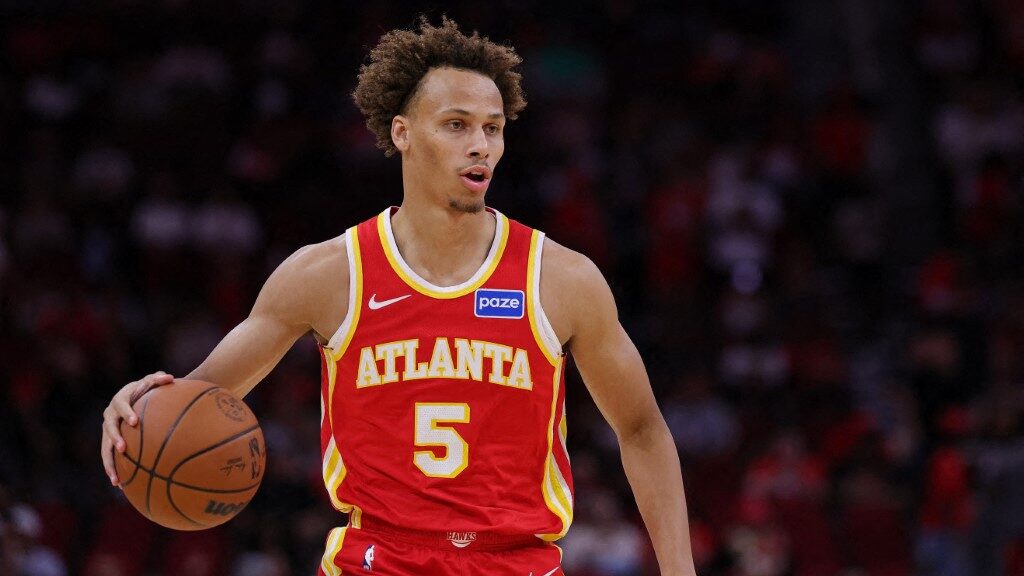 HOUSTON, TEXAS - OCTOBER 06: Dyson Daniels #5 of the Atlanta Hawks handles the ball against the Houston Rockets during the first half in a preseason game at Toyota Center on October 06, 2025 in Houston, Texas. NOTE TO USER: User expressly acknowledges and agrees that, by downloading and or using this photograph, User is consenting to the terms and conditions of the Getty Images License Agreement. Alex Slitz/Getty Images/AFP (Photo by Alex Slitz / GETTY IMAGES NORTH AMERICA / Getty Images via AFP)